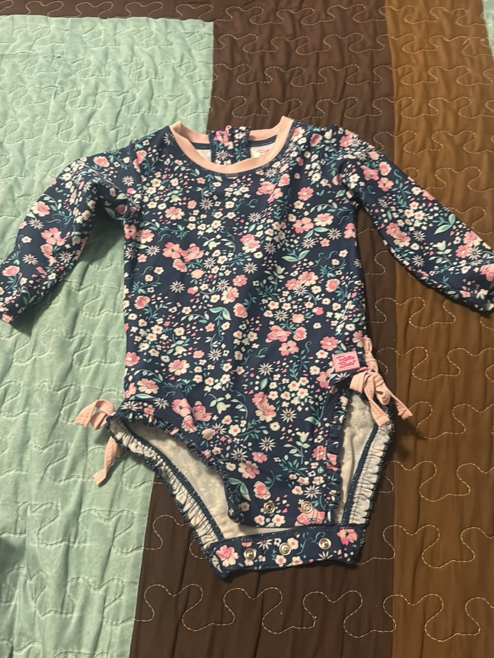 Girls Floral Long-Sleeve One-Piece Swimsuit in Navy with Pink Trim